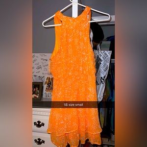 Pretty orange dress with neck band!